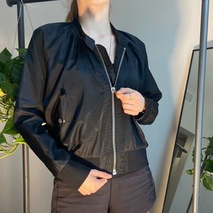 Black bomber jacket with heavy duty high quality silver zipper.